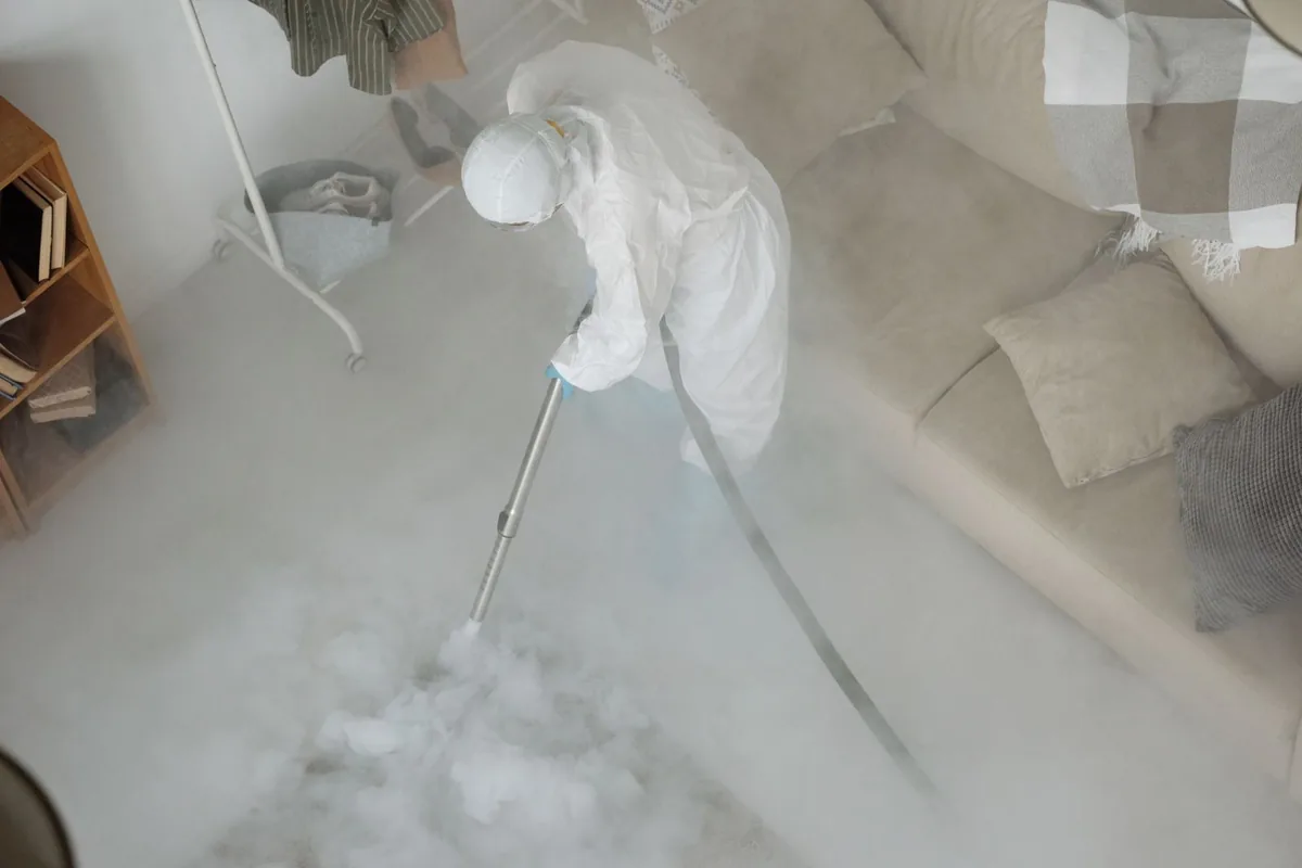 Biohazard cleanup technician in protective equipment, Bexley, OH